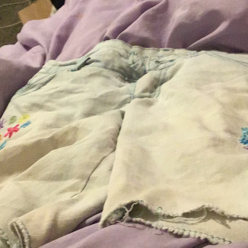 Peace sign jean shorts